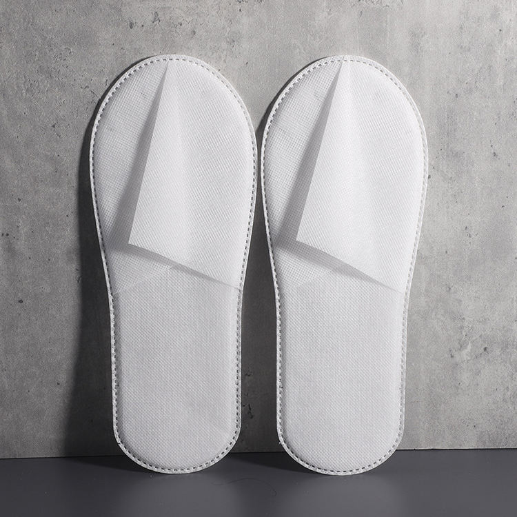 맞춤형 흰색 원피스 부직포 호텔 슬리퍼 – 호텔 및 SPA, B2B 공급업체 및 제조업체를 위한 저렴한 일회용 미끄럼 방지 신발